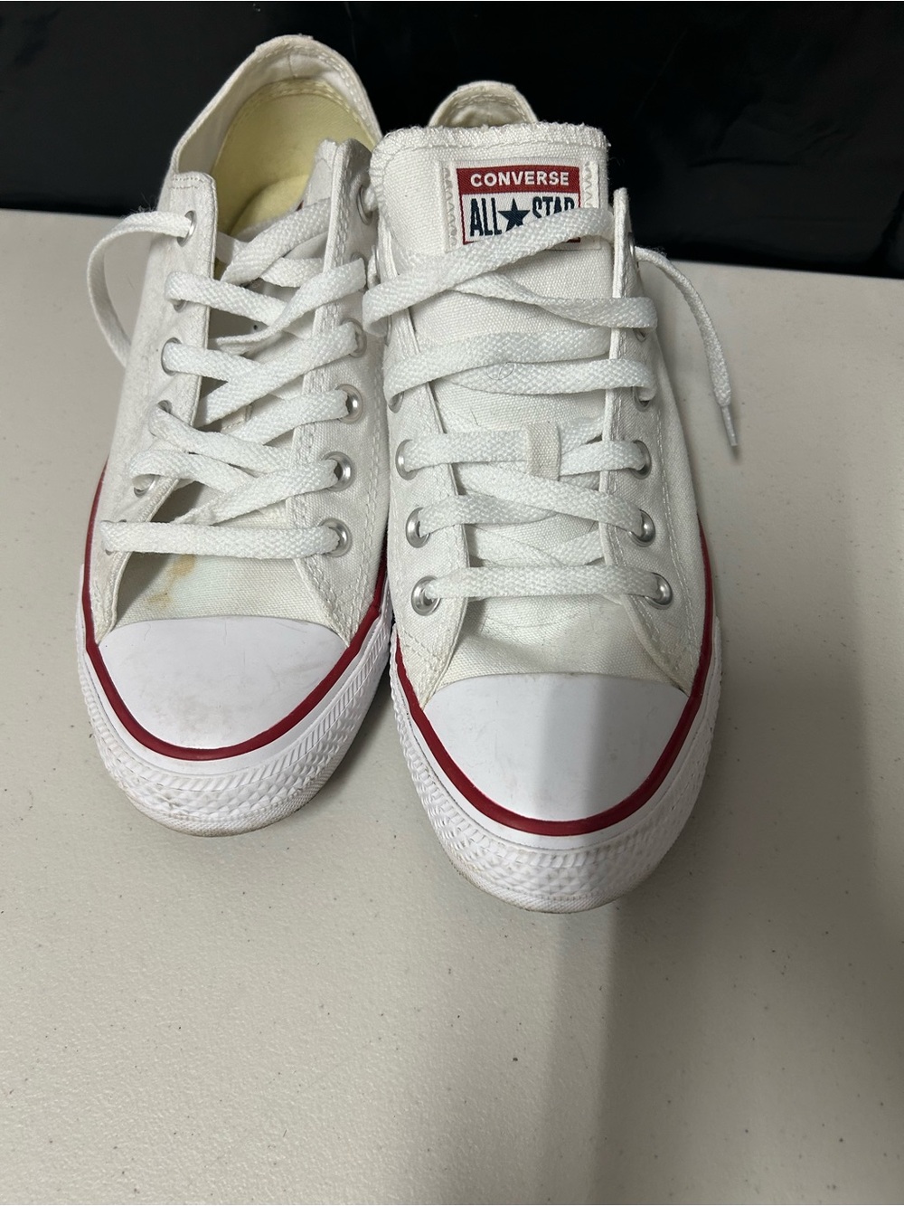 Converse White Low Top Sneakers with Red Stripe